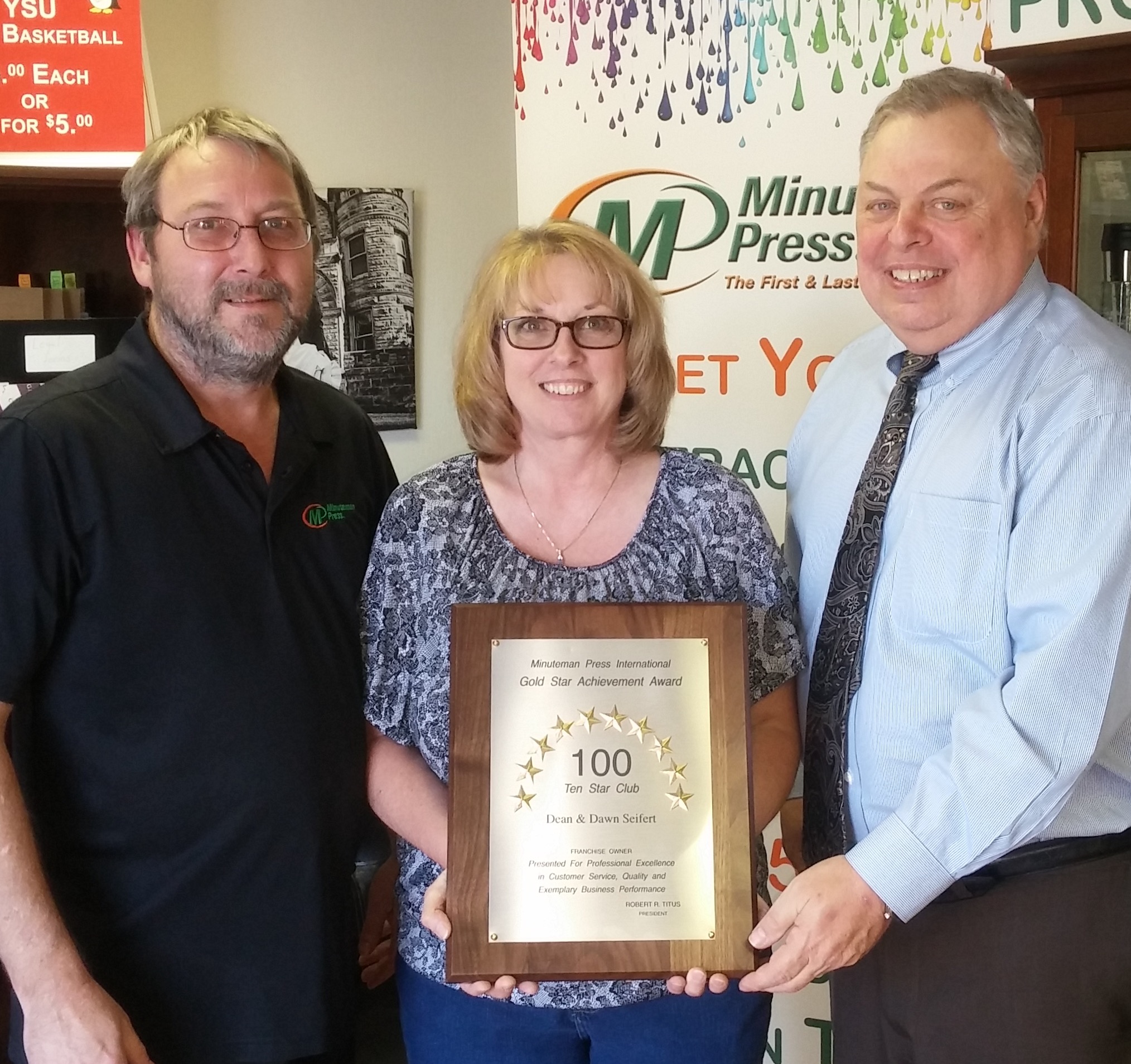 Youngstown, Ohio Minuteman Press franchise owners Dean Seifert (left) and Dawn Seifert (center), along with Gary Nowak (right), Minuteman Press International Regional Vice President for the Ohio region